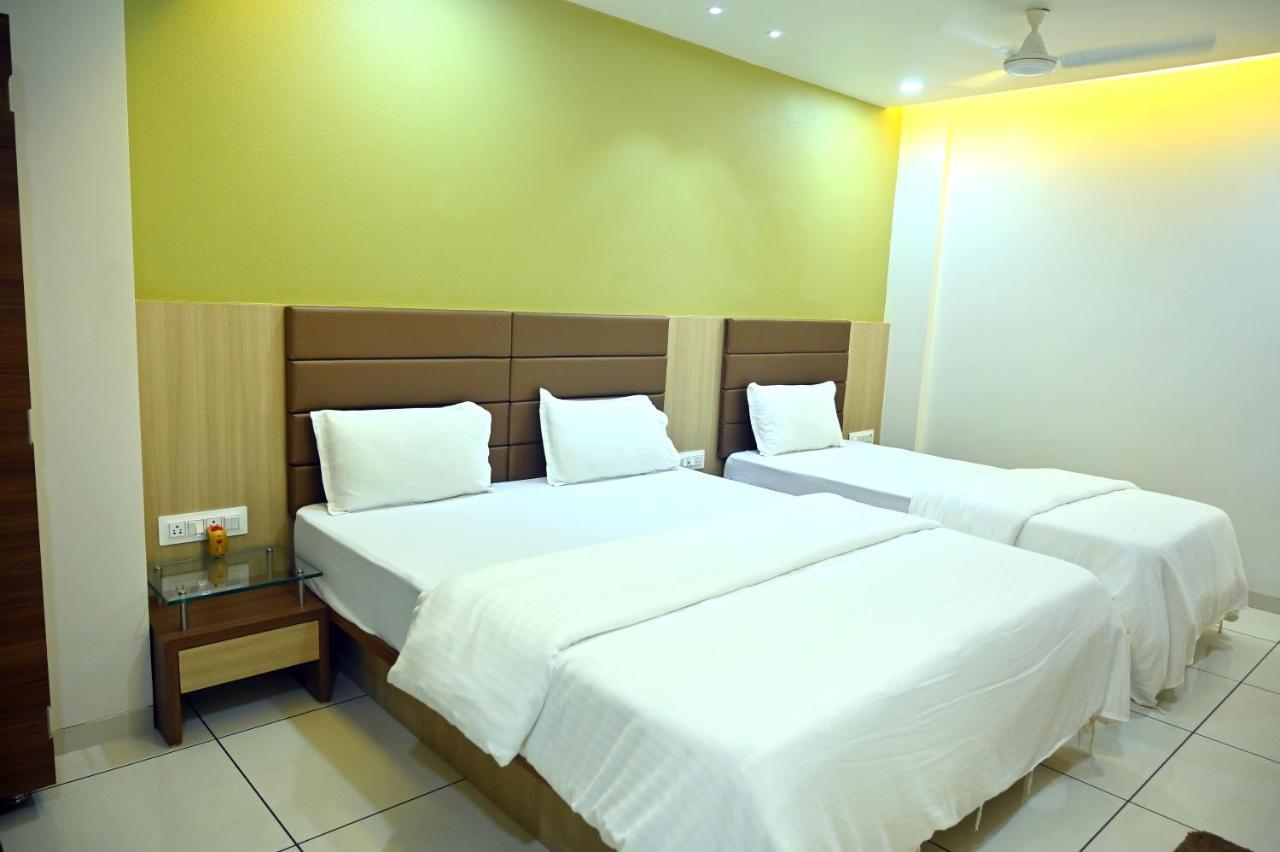 Hotel Aaram Umargam Bagian luar foto