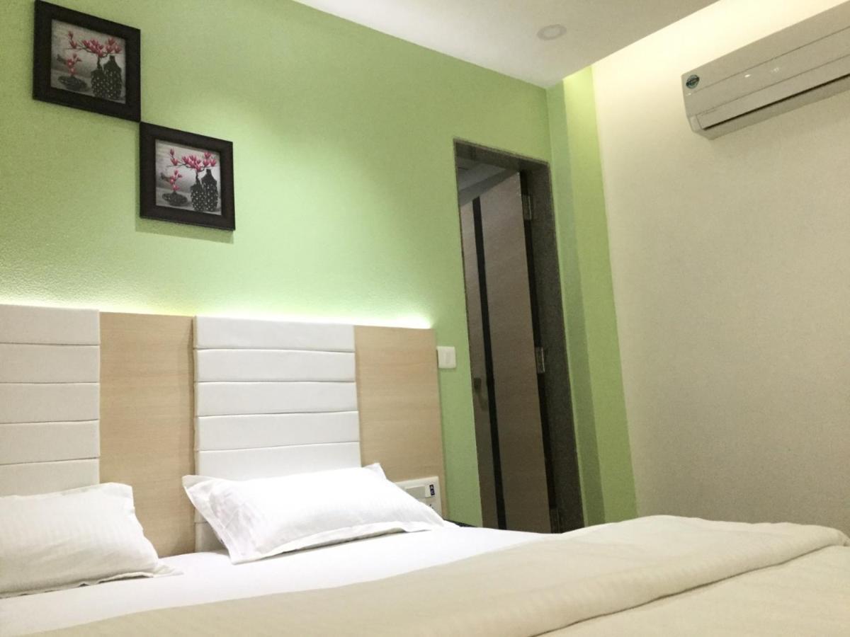 Hotel Aaram Umargam Bagian luar foto